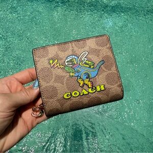 Cosmic Coach Snap Wallet in Signature Canvas With Rexy Print